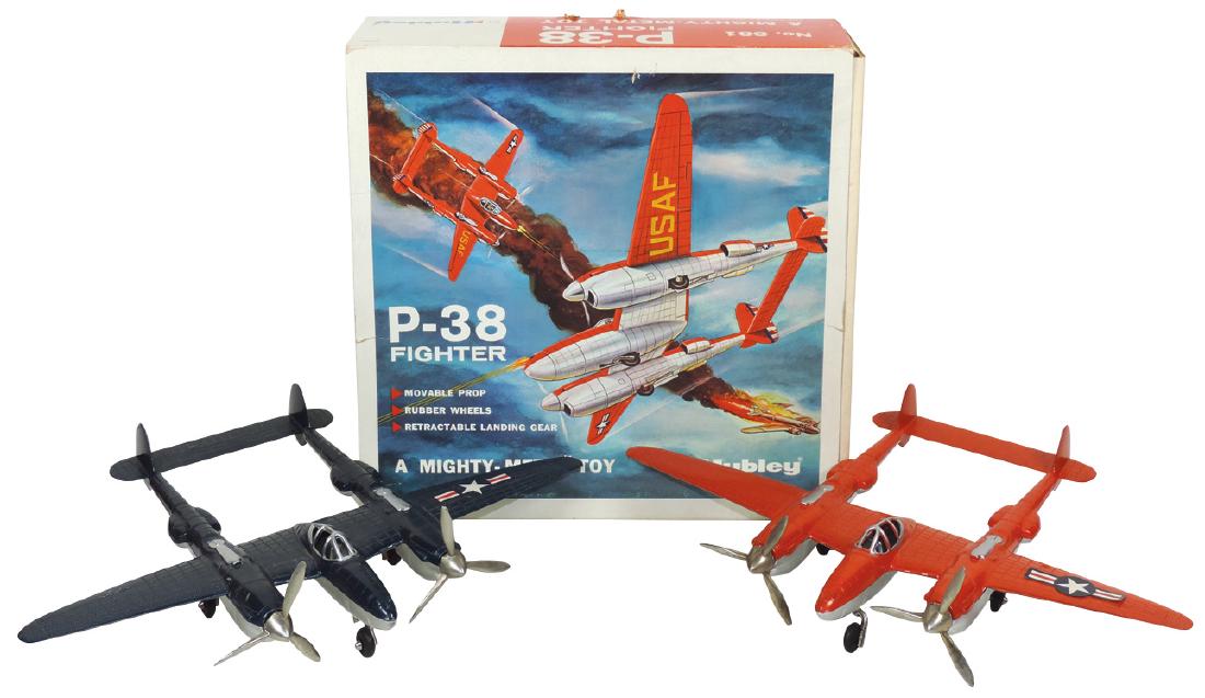Toy airplanes (2), Hubley; #881 P-38, red/silver, orig: Toy airplanes (2), Hubley; #881 P-38, red/silver, orig box w/slide-off sleeve, Mint cond & #881 P-38 navy blue/silver, part of 1962 airport set, Exc+ cond, post-war, diecast metal, both 9"L x 12.5"W.