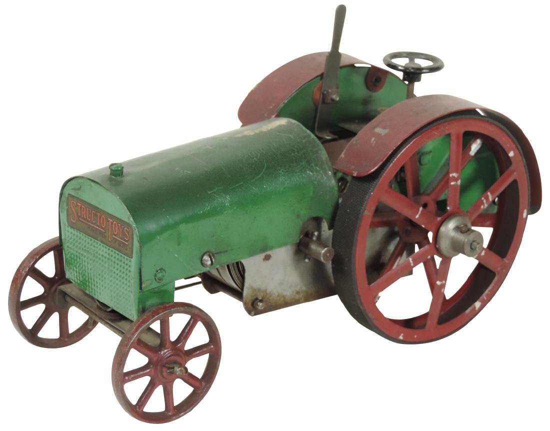 Toy tractor, Structo Toys Model No. 11, pressed steel: Toy tractor, Structo Toys Model No. 11, pressed steel w/orig red/green paint & decal, windup clockwork motor, just like the one in the National Museum of American History, Exc cond w/minor paint scuff