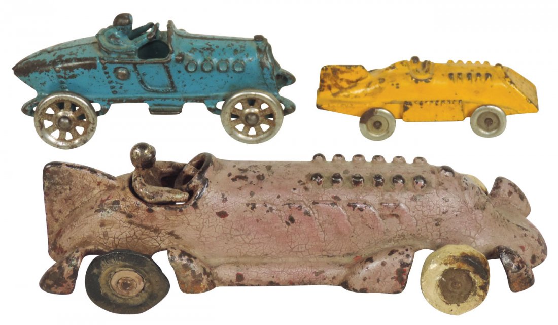 Toy race cars (3), Arcade w/orig paint; fishtail,: Toy race cars (3), Arcade w/orig paint; fishtail, repainted w/replaced tire & Hubley, orig paint w/some overall loss, all cast iron in Good/VG cond, up to 9"L.