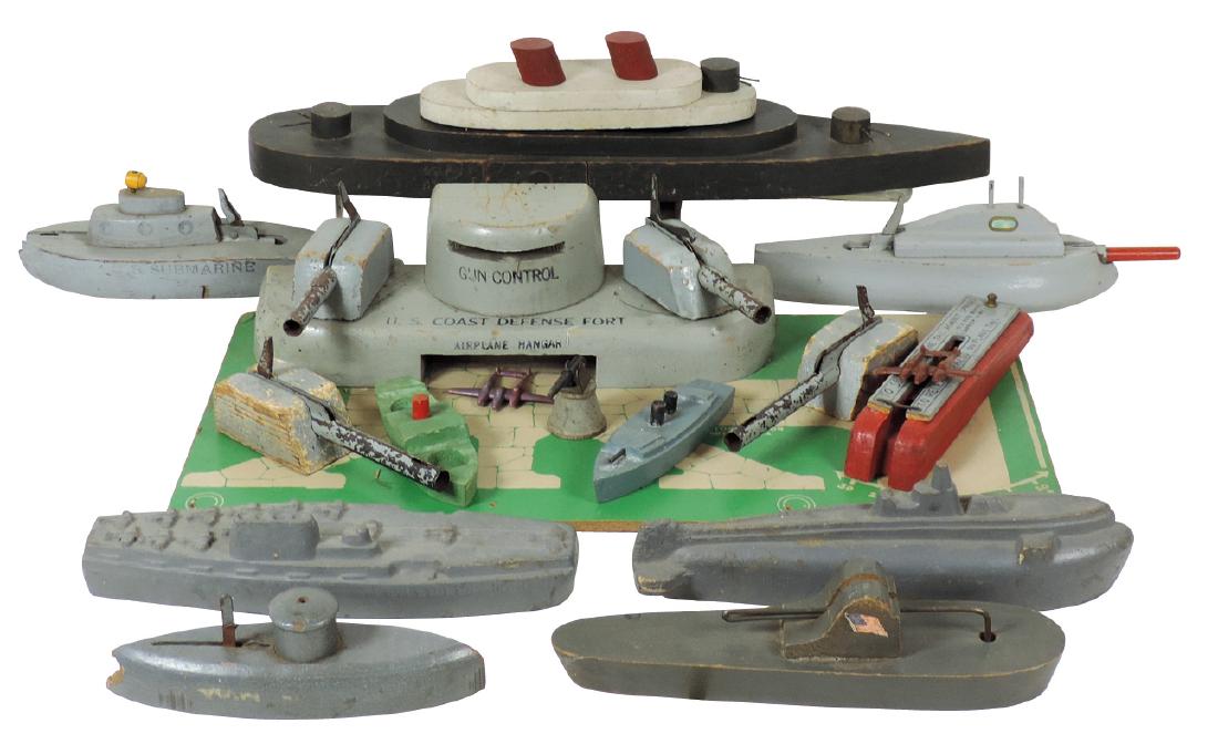 Toy boats (8), battleships, aircraft carrier,: Toy boats (8), battleships, aircraft carrier, submarines & U.S. Coast Defense Fort (U.S. Flying Field X-22), wood, some missing parts, Good cond, 6"-16"L.