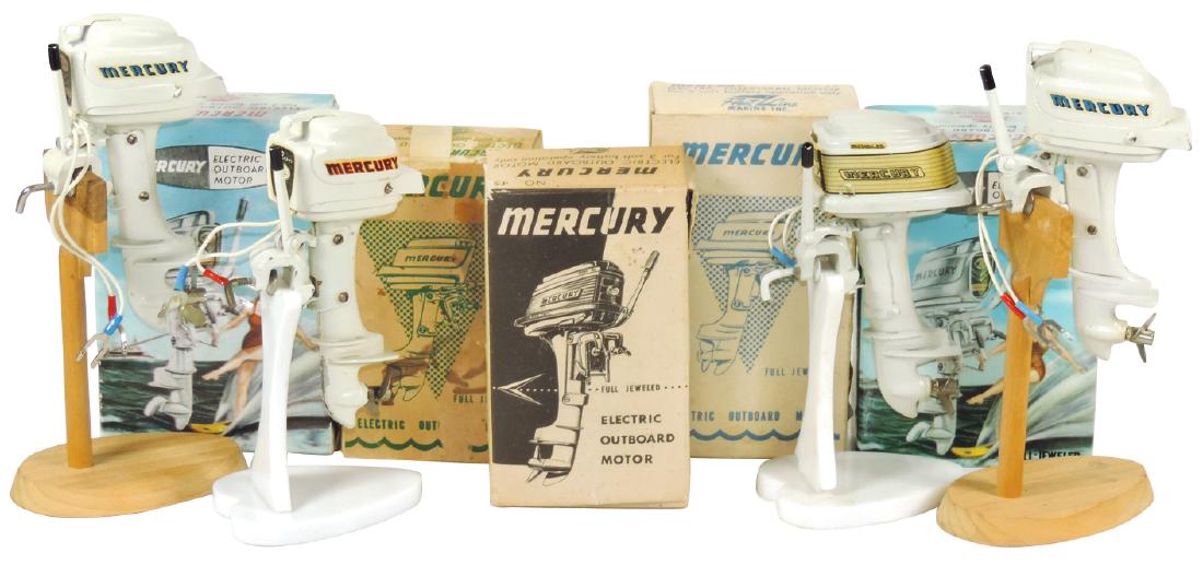 Toy boat motors (4), Mercury (2 wkg) w/boxes & extra: Toy boat motors (4), Mercury (2 wkg) w/boxes & extra box, all cast metal, VG/VG+ cond, up to 4"H.