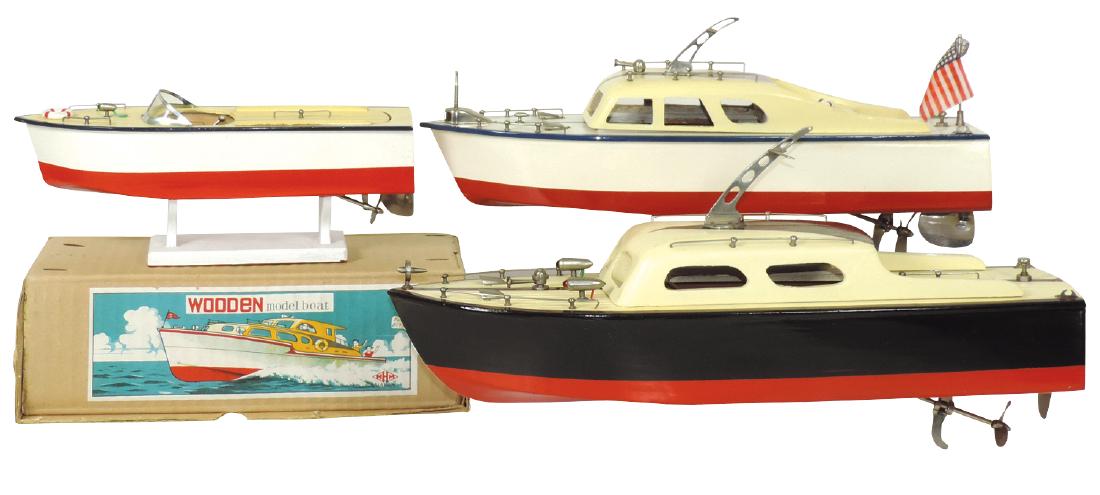 Toy boats (3), MHM Japan wood speedboat, battery: Toy boats (3), MHM Japan wood speedboat, battery powered, Good cond w/box, 11"L & Japanese cruisers, wood, battery powered, VG cond, 14"L & 15"L.
