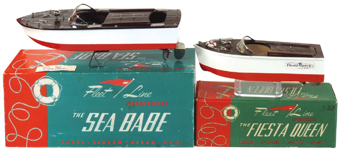 Toy boats (2), Fleet Line "The Sea Babe" w/orig: Toy boats (2), Fleet Line "The Sea Babe" w/orig lift-off box & inst, Near-Mint wkg cond, 12"L x 4.5"W & "The Fiesta Queen" w/orig box/decal in Mint wkg cond, 9.5"L x 3.25"W.