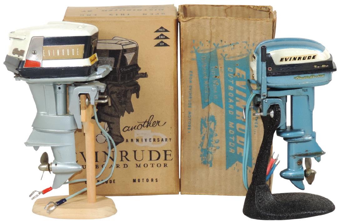 Toy boat motors (2), Fleet Line 1959 Evinrude Starflite: Toy boat motors (2), Fleet Line 1959 Evinrude Starflite 50HP w/box/inst, VG/Exc cond & Evinrude Big Twin Electric w/box, VG cond w/dark blue touch-up paint, both cast metal, up to 6"H.