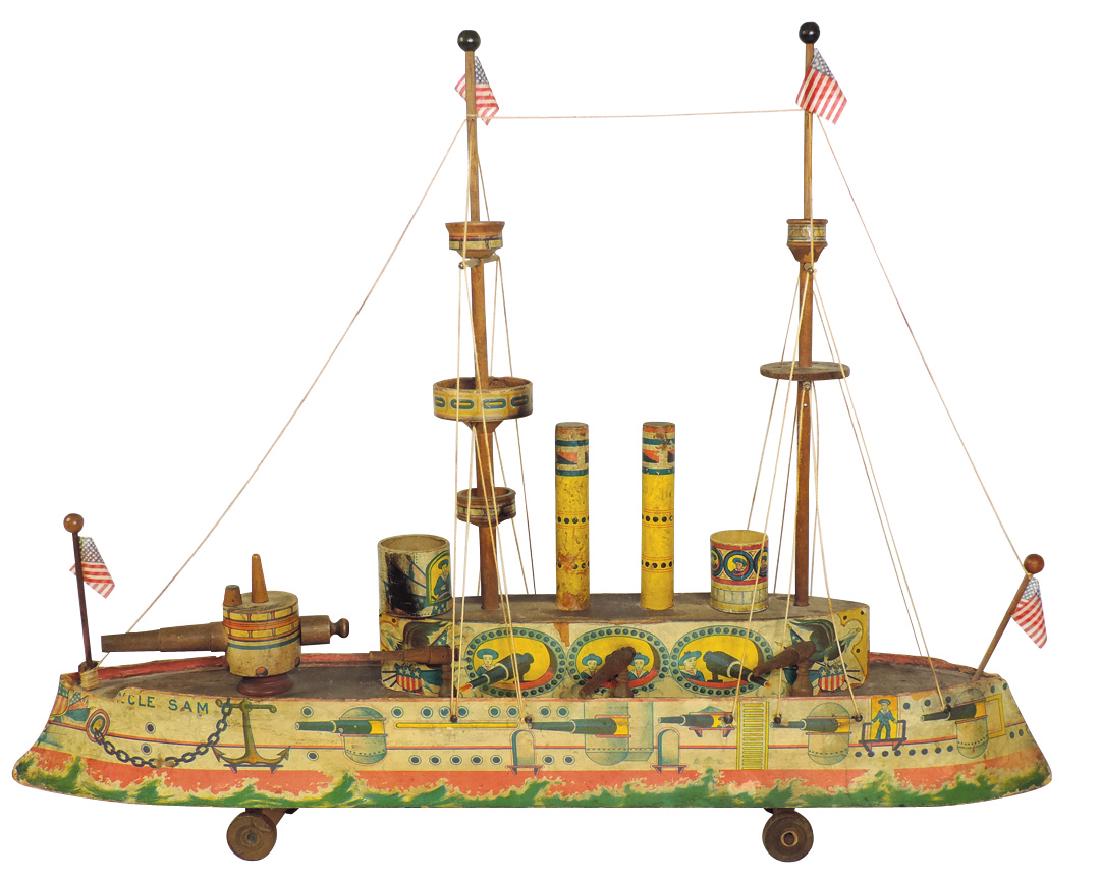 Toy boat, Bliss battleship, "Uncle Sam", litho on: Toy boat, Bliss battleship, "Uncle Sam", litho on cdbd/wood, c.1890, complete, VG cond w/some wear, 23"H x 31"L.