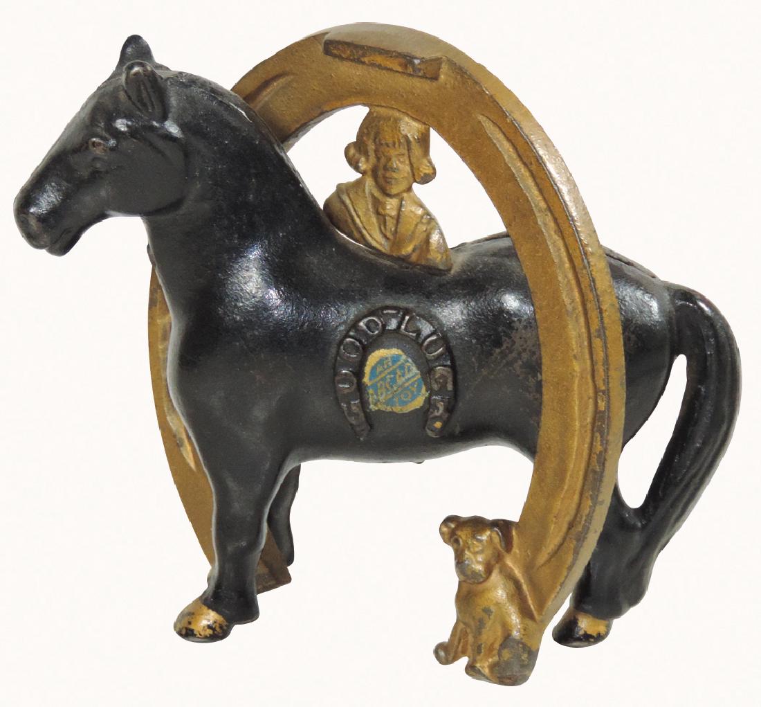 Still bank, Arcade Buster Brown & Tige Good Luck Horse: Still bank, Arcade Buster Brown & Tige Good Luck Horse Shoe, early 1900's, cast iron w/orig black & gold paint, Exc cond, 4.5"H x 5"D.