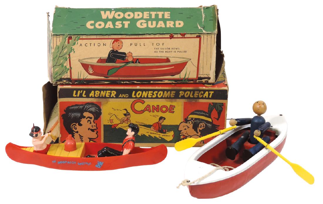 Toy boats (2), Woodette Coast Guard, painted metal/wood: Toy boats (2), Woodette Coast Guard, painted metal/wood pull toy, VG cond w/Good box, 12"L & Ideal "Li'l Abner & Lonesome Polecat" canoe, plastic windup, Good cond w/Fair box,12"L.