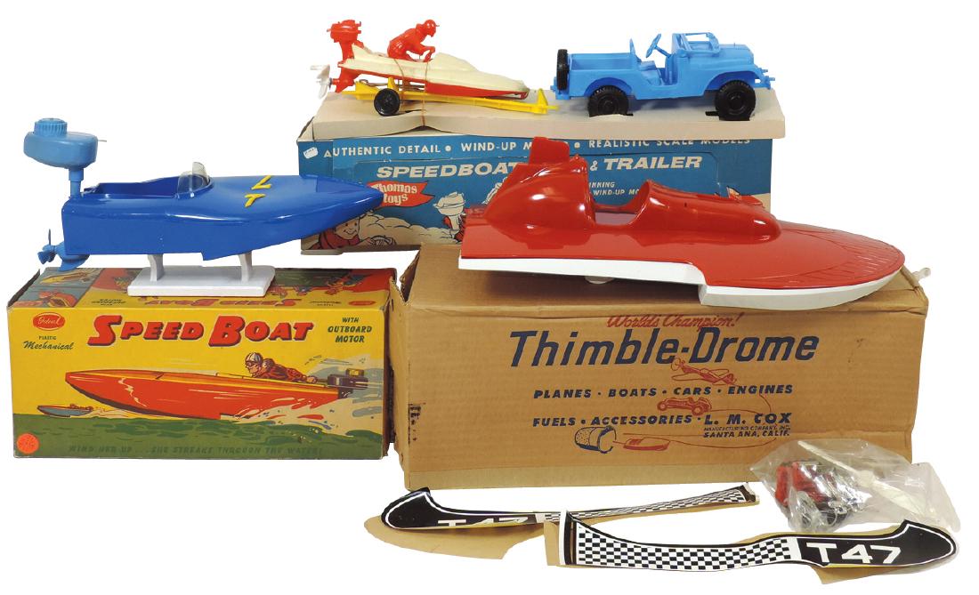 Toy boats (3), L.M. Cox Thimble-Drome Water Wizard,: Toy boats (3), L.M. Cox Thimble-Drome Water Wizard, plastic, no engine, VG cond w/Good box & extra pcs, 15"L; Ideal speedboat w/outboard motor, plastic windup, VG/Exc cond w/VG box, 11"L & Thomas spee