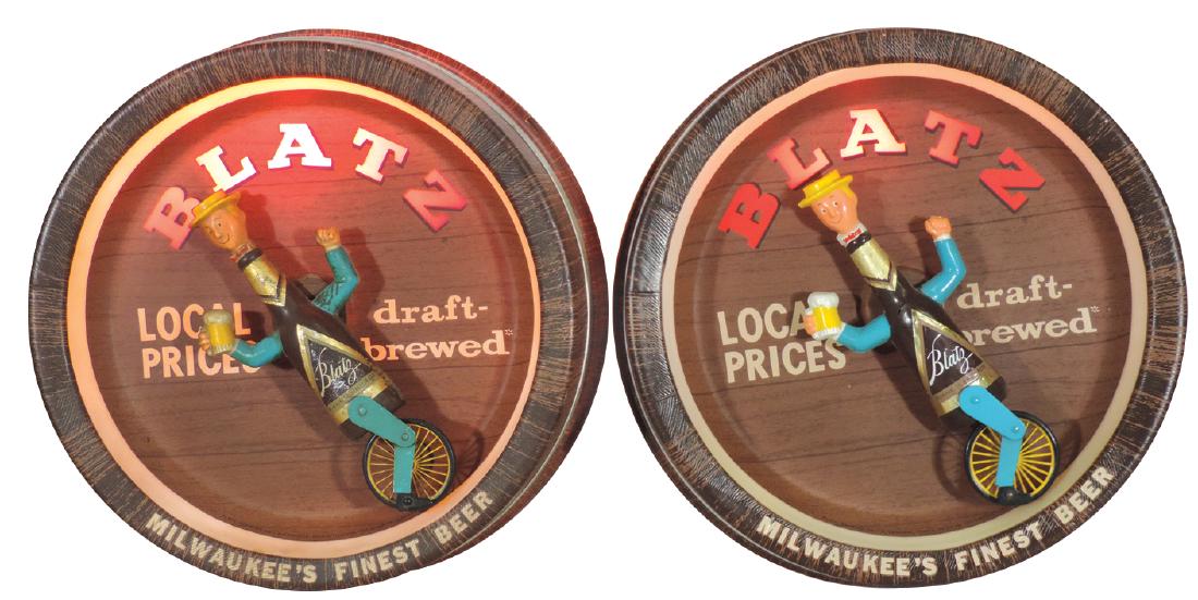 Breweriana signs (2), Blatz Beer plastic lightups: Breweriana signs (2), Blatz Beer plastic lightups w/motion, Blatz man on unicycle, both VG wkg cond, 19"Dia.