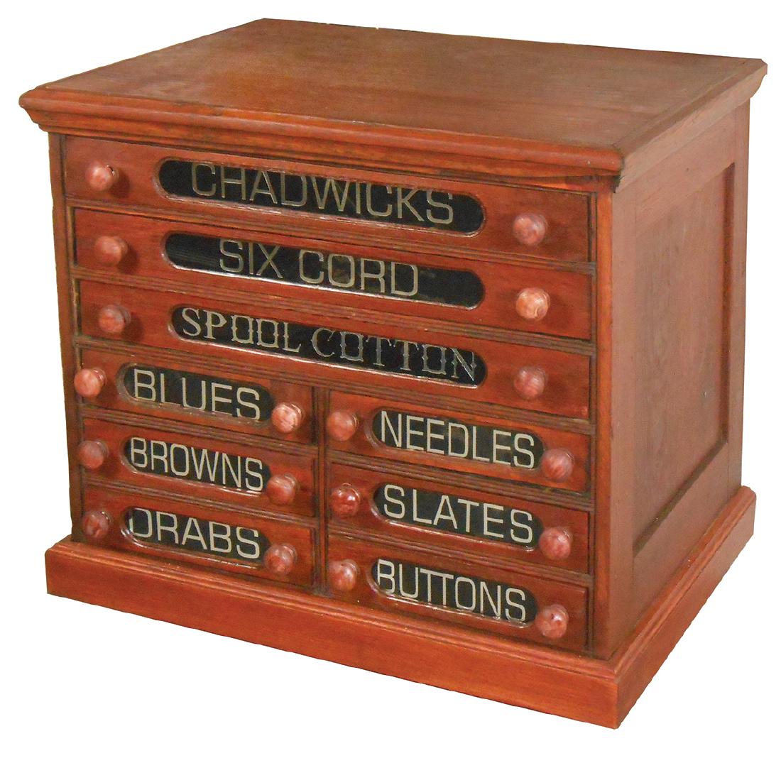 Country store spool cabinet, Chadwick's walnut 9-drwr: Country store spool cabinet, Chadwick's walnut 9-drwr w/glass inserts, Exc restored cond w/some replacement parts, 22"H x 25"W x 17.5"D.
