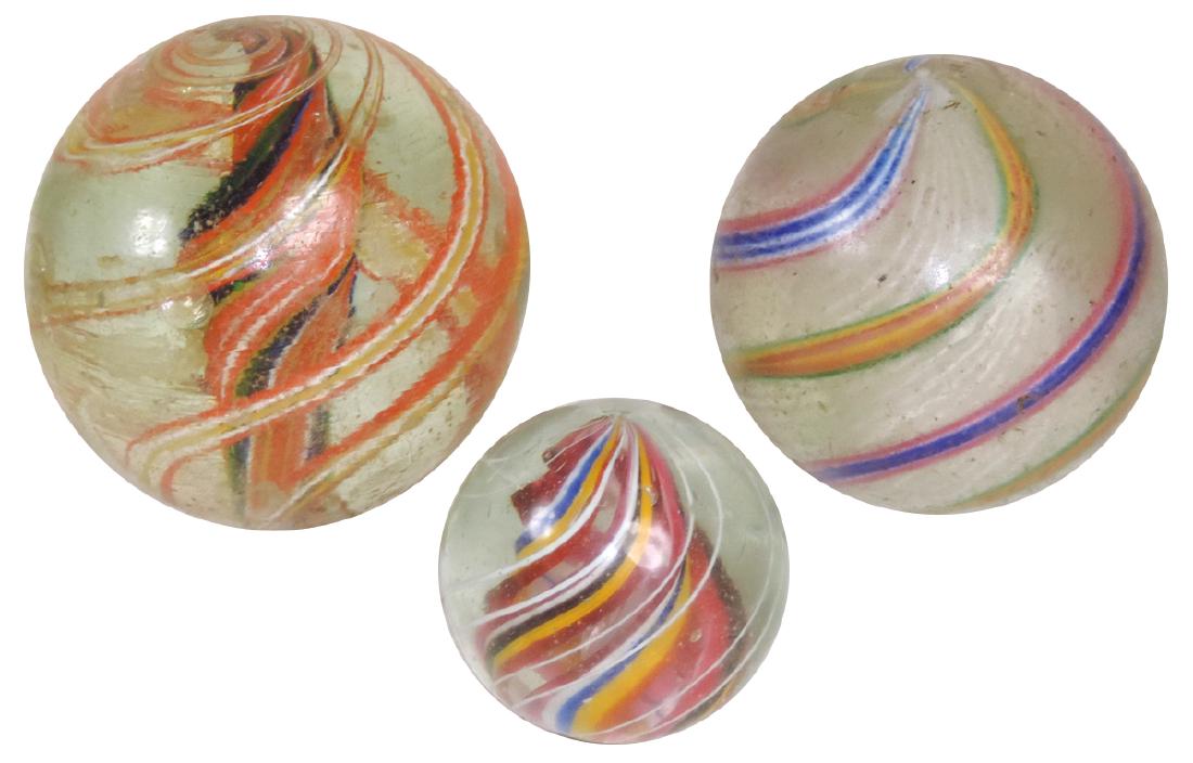 Marbles (3), Latticinio core-white, outer bands of blue: Marbles (3), Latticinio core-white, outer bands of blue & red, VG+ cond w/few minor chips, 2"Dia; Divided Core of red, white, blue & yellow w/outer lines of white, Exc cond, 1.5"Dia & Solid Twisted Co