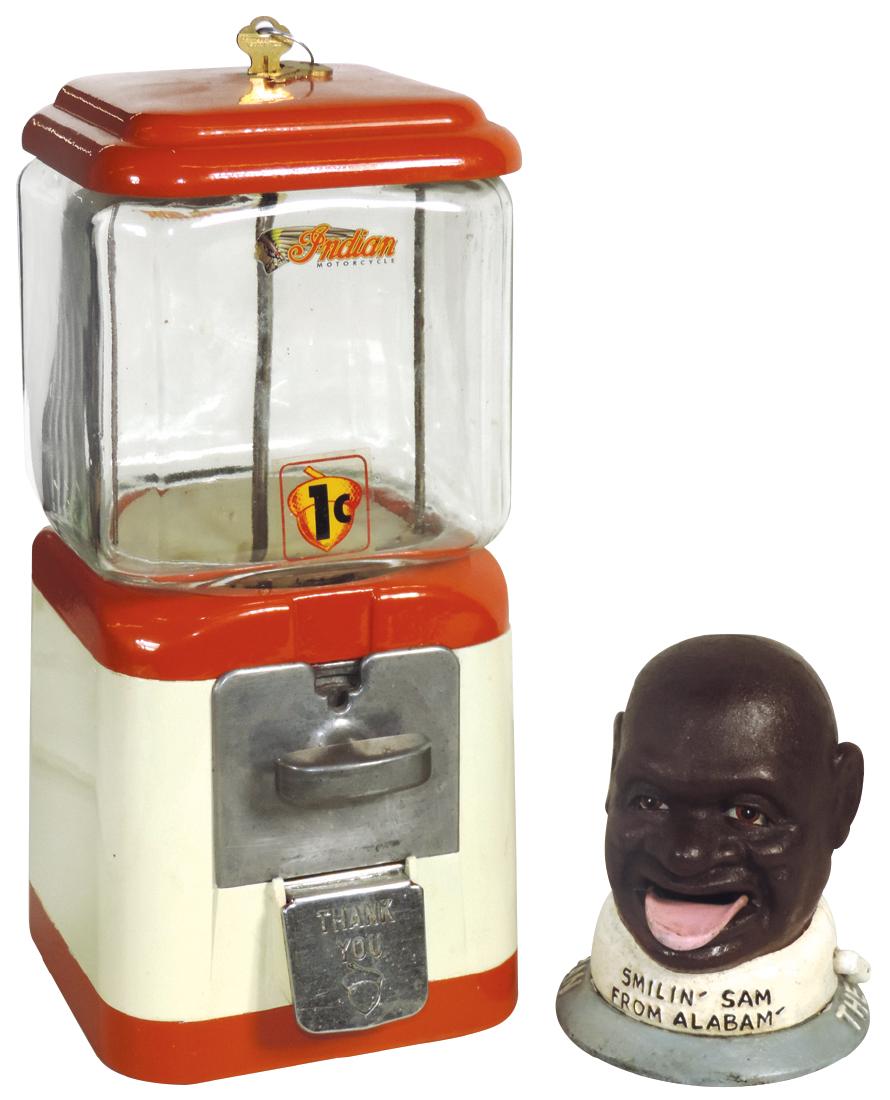 Coin-operated bank & peanut machine (2), "Smilin Sam: Coin-operated bank & peanut machine (2), "Smilin Sam from Alabam-The Salted Peanut Man", eyes roll as tongue is depressed, cast iron, VG cond & Acorn 1 Cent peanut machine, Exc cond w/keys, 6"H & 14"H