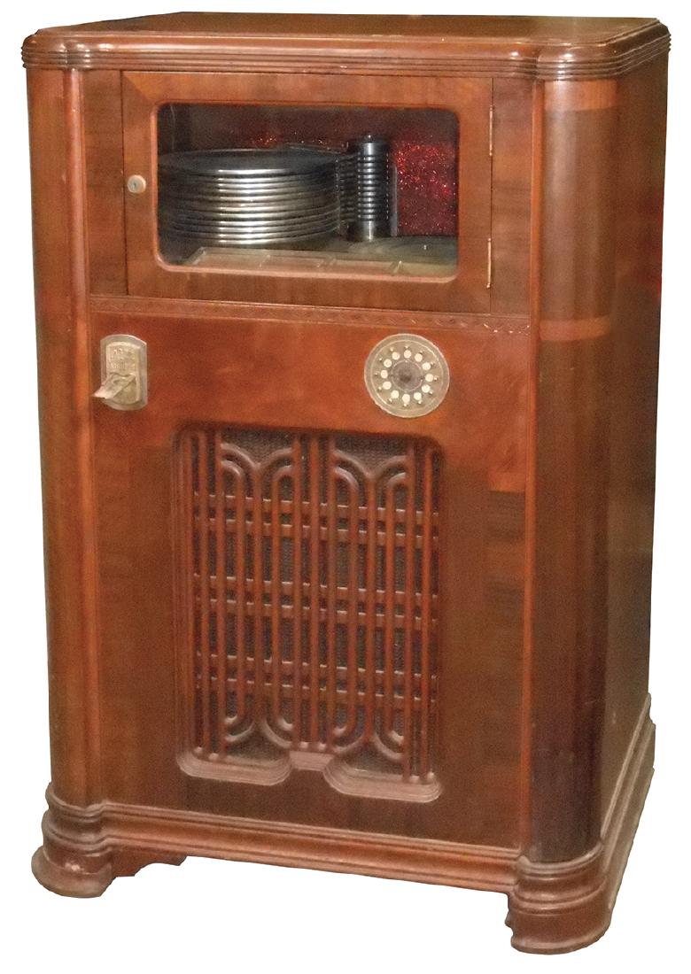 Coin-operated jukebox, Wurlitzer P-12, 5 Cent, 12: Coin-operated jukebox, Wurlitzer P-12, 5 Cent, 12 selection, c.1935, walnut veneer cabinet in VG cosmetic cond, mech looks nearly complete, non-wkg, 49"H x 31"W x 23"D.
