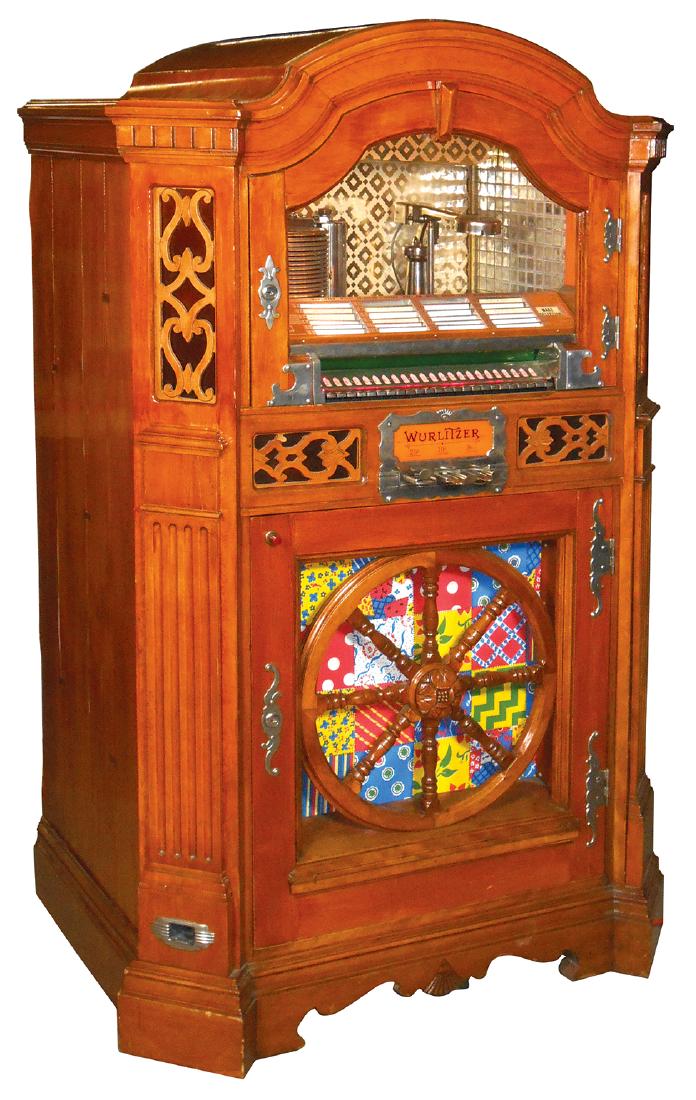 Coin-operated jukebox, Wurlitzer Model 780-E, Serial: Coin-operated jukebox, Wurlitzer Model 780-E, Serial #773267, machine is complete, including slug rejector & grinder, some cosmetic issues w/loose veneer, old restoration, VG wkg cond, 61"H x 36"W.