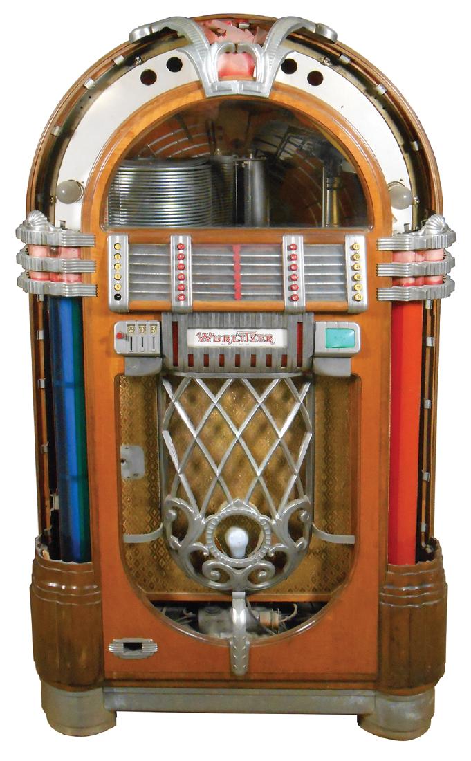 Coin-operated jukebox, Wurlitzer 1015, classic Paul: Coin-operated jukebox, Wurlitzer 1015, classic Paul Fuller designed "Bubbler", Exc "as found" orig cond, cabinet solid, has grinder & set of 4 plastics, missing slug rejector & bubble tubes, o/wise co