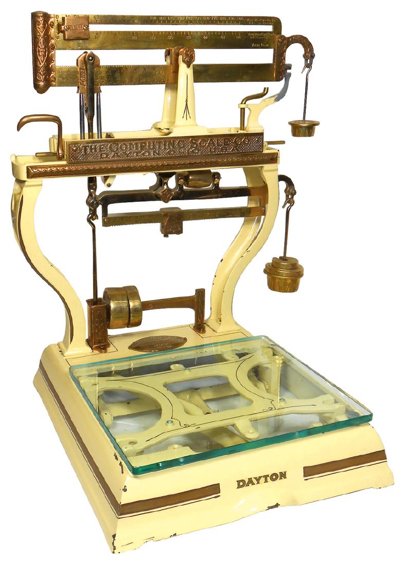 Country store scale, The Computing Scale Co.-Dayton,: Country store scale, The Computing Scale Co.-Dayton, OH, c.1900, has adjustable beam for weight & value, called the "Money Weight", VG/Exc cond w/older restoration, 26"H x 21"W x 19"D.