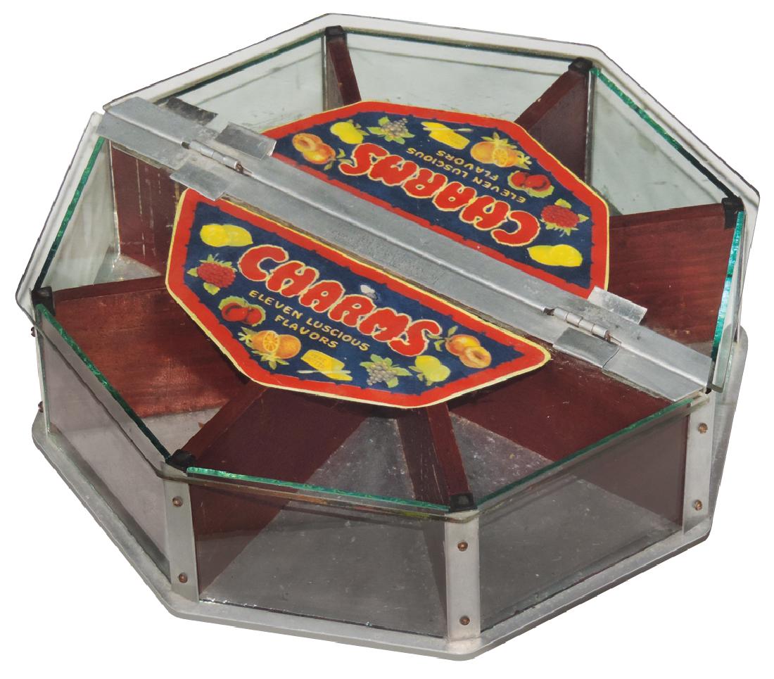 Candy store display case, Charms, 8-sided revolving: Candy store display case, Charms, 8-sided revolving metal, glass & wood display w/lift-up lids, Exc cond, 5"H x 13"W.