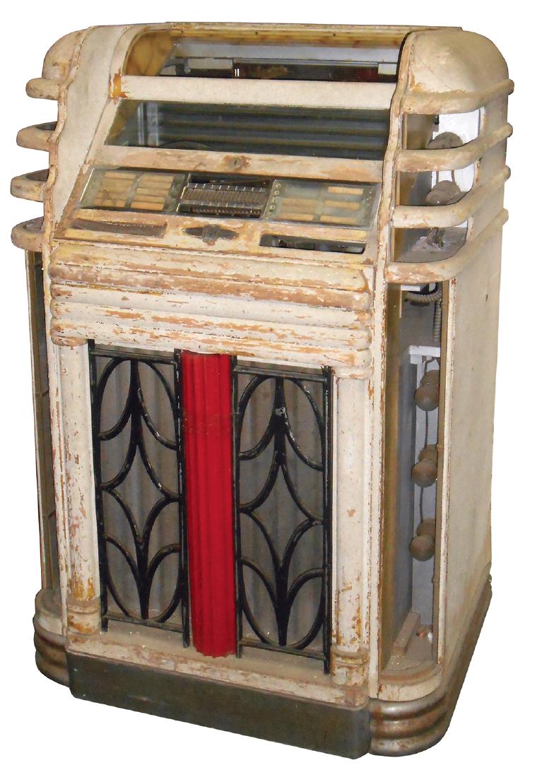 Coin-operated jukebox, AMI, Automatic Instrument: Coin-operated jukebox, AMI, Automatic Instrument Co.-Grand Rapids, MI, Rare "Streamliner" Model 3C, made by H.L. Talpin Co.-Ont, Canada, c.1938, has 20 coin slots for selection mech, missing plastics,