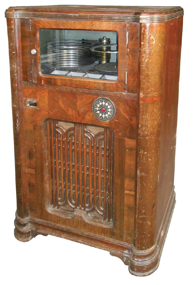 Coin-operated jukebox, Wurlitzer Simplex P12, walnut: Coin-operated jukebox, Wurlitzer Simplex P12, walnut cabinet, c.1935, mech mostly complete, coin mech missing, Good restorable cosmetic cond, 49"H x 31"W x 23"D.