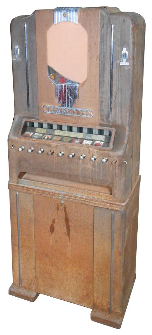 Coin-operated cigarette machine, mfgd by National: Coin-operated cigarette machine, mfgd by National vendors Inc., vends 9 brands for 15 Cents & matches for 1 Cent, c.1940, as-found cond w/broken mirror & no keys, o/wise appears complete, 68"H x 28"W 