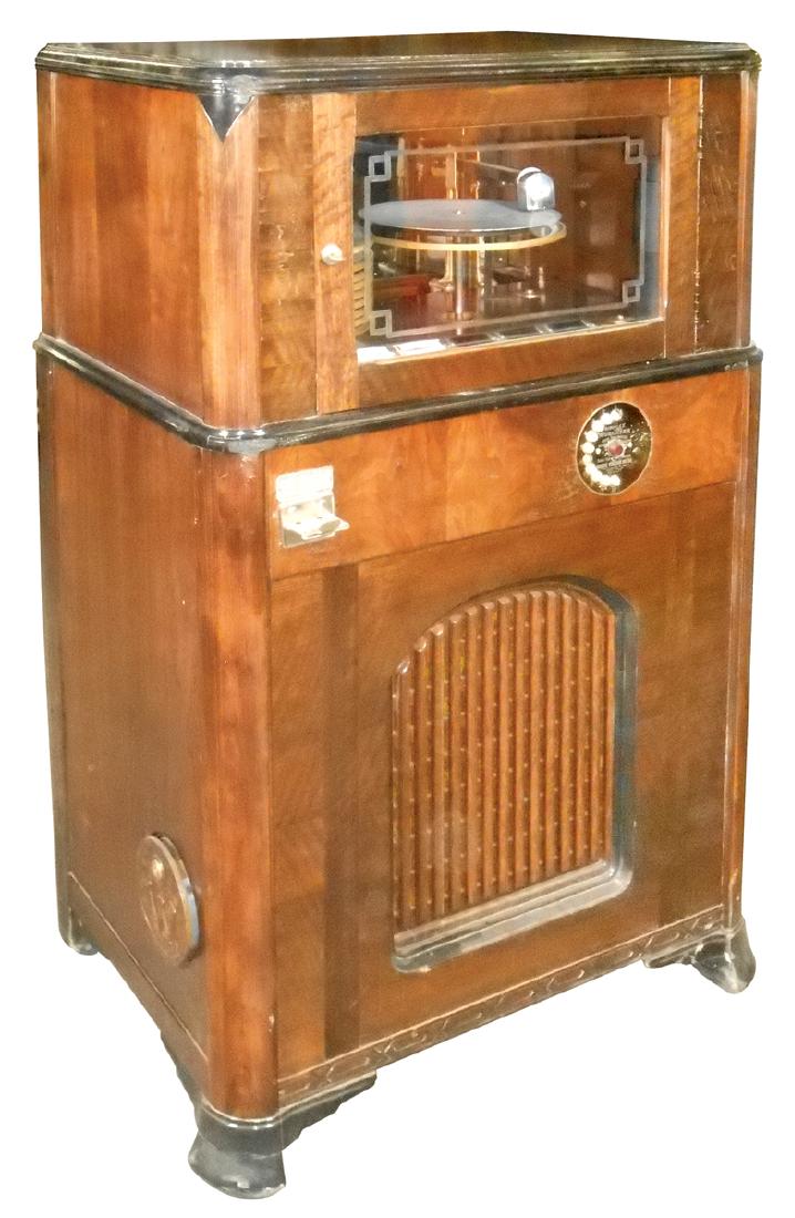 Coin-operated jukebox, Wurlitzer Simplex, Model P-10,: Coin-operated jukebox, Wurlitzer Simplex, Model P-10, c.1934, older restoration, mechanics seem to work, needs tone arm/pickup repair, few minor scuffs, 49"H x 30"W x 23"D.