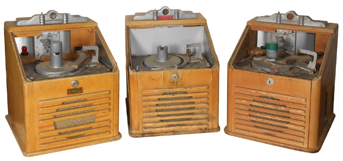 Coin-operated jukeboxes (3), Ristaucrat & Automatic: Coin-operated jukeboxes (3), Ristaucrat & Automatic Phonograph-Appleton, WI brands, parts machines, need plastics, c.1951, could be enough parts to restore 2 machines, 14"H x 13"W x 13"D.