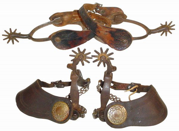 Spurs (2) pr.; August Buermann & Anchor brands, bo: Spurs (2) pr.; August Buermann & Anchor brands, both steel w/tooled leathers, Buermann has large concho, both w/1.75" rowels & VG condition.
