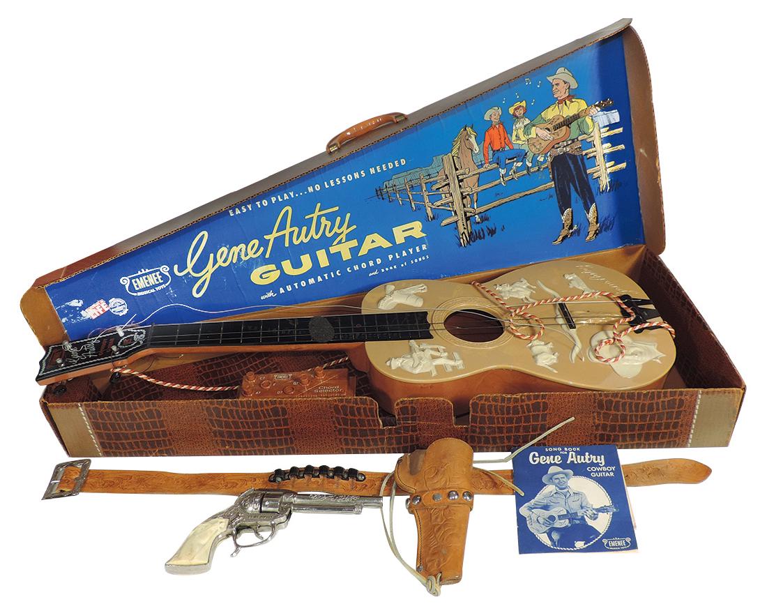 Gene Autry guitar, holster & poster, Emenee Musical: Gene Autry guitar, holster & poster, Emenee Musical Toys Guitar w/Automatic Chord Player & Book of Songs in orig box; gun in single tooled leather holster & 1954 movie poster, "The Cowboy and the Indi