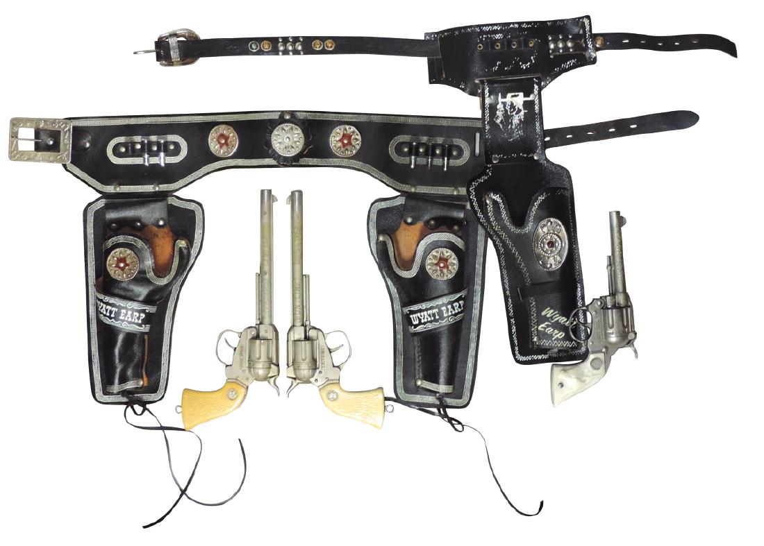 Toy cap guns & holsters (2), Wyatt Earp double Spitfire: Toy cap guns & holsters (2), Wyatt Earp double Spitfire Buntline Special & single Service, both VG wkg cond, longest belt 32"L.