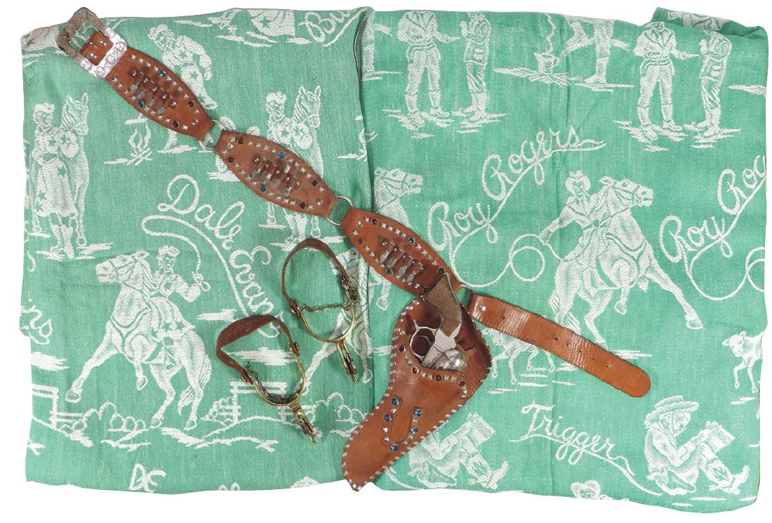 Roy Rogers & Trigger & Dale Evans & Buttermilk: Roy Rogers & Trigger & Dale Evans & Buttermilk bedspreads & accessories (4), bedspreads white on green, Dale's in VG cond w/some stain, 90"L x 71"W, Roy's in Exc cond, 102"L x 66"W; RR Geo. Schmidt gu