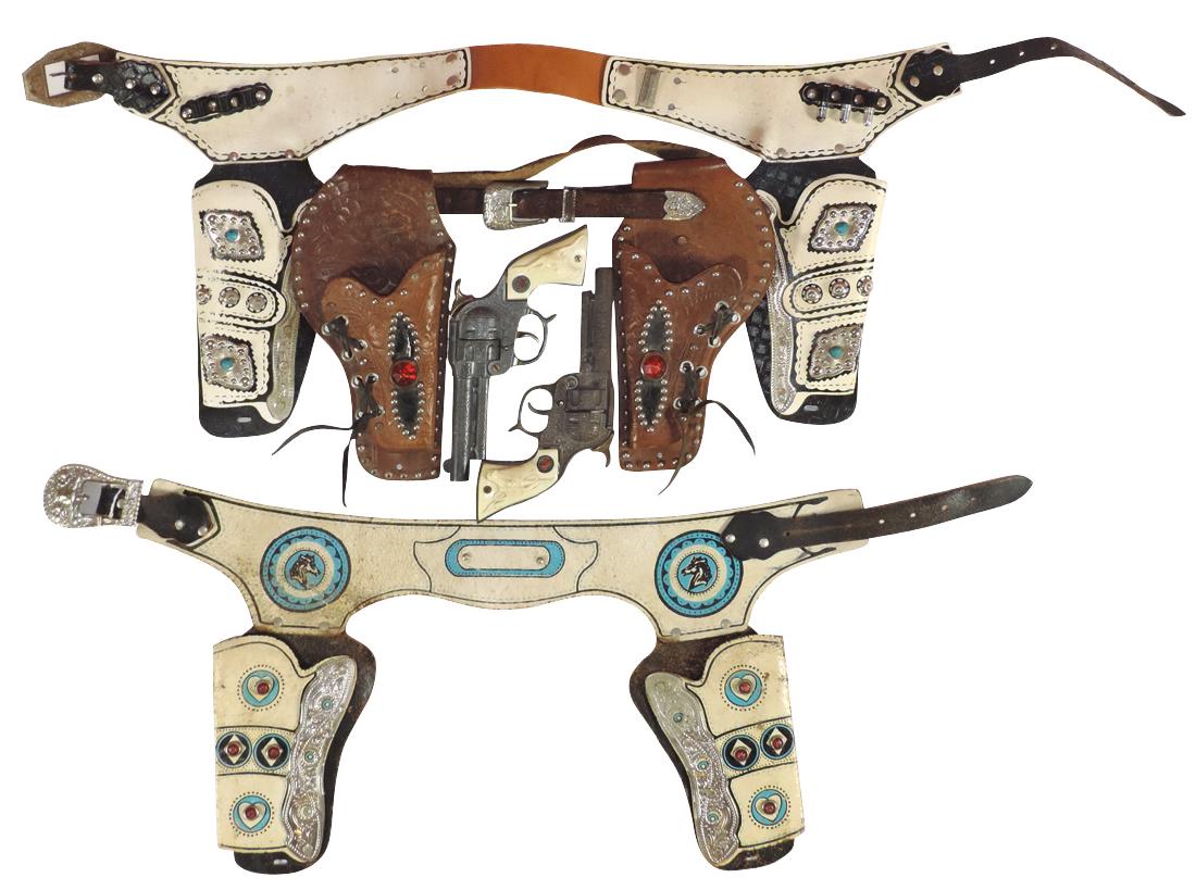 Toy cap guns & holsters (5), tooled leather double (1 of 1)