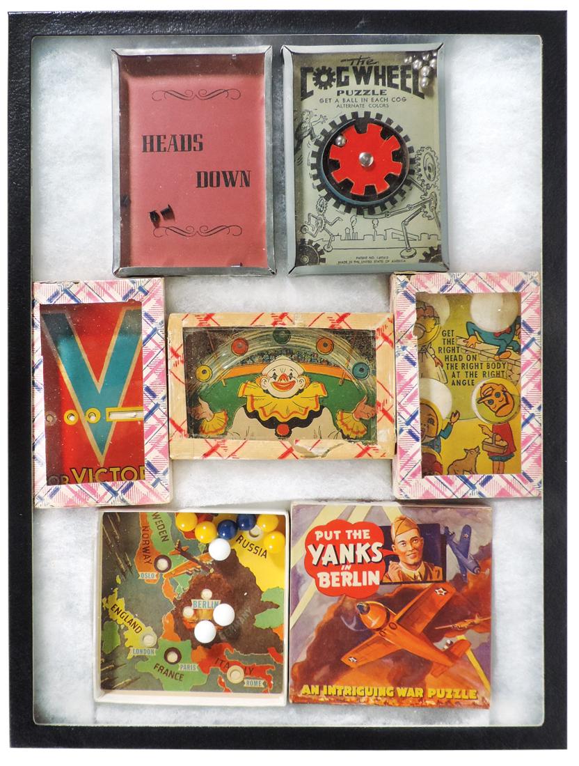 Toy dexterity puzzles (11), Cog Wheel, V for Victory,: Toy dexterity puzzles (11), Cog Wheel, V for Victory, Heads Down, Put the Yanks in Berlin, Clown, Trap the Jap in Tokyo, (2) Roll Bingo & (2) w/military scenes, all VG to Exc cond, 3.5" x 5".