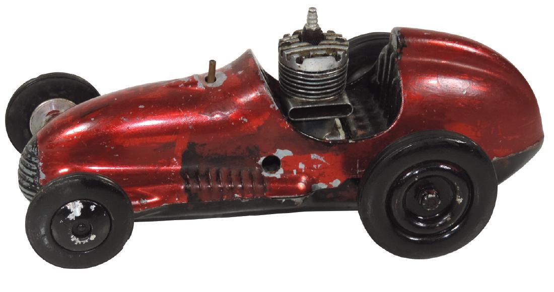 Toy tether race car, Real McCoy, orig red metallic (1 of 1)