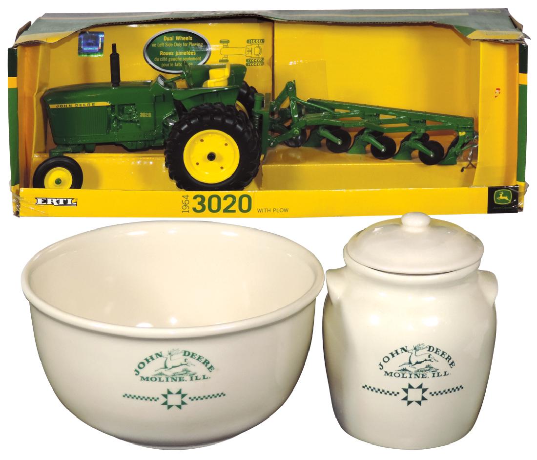 Toy John Deere tractor w/plow, mixing bowl & cookie jar: Toy John Deere tractor w/plow, mixing bowl & cookie jar (3), bowl & cookie jar both ceramic w/John Deere Moline, Ill. green logo & Ertl 3020 tractor w/plow in orig box, c.1964, all Exc cond, 5.75"H x