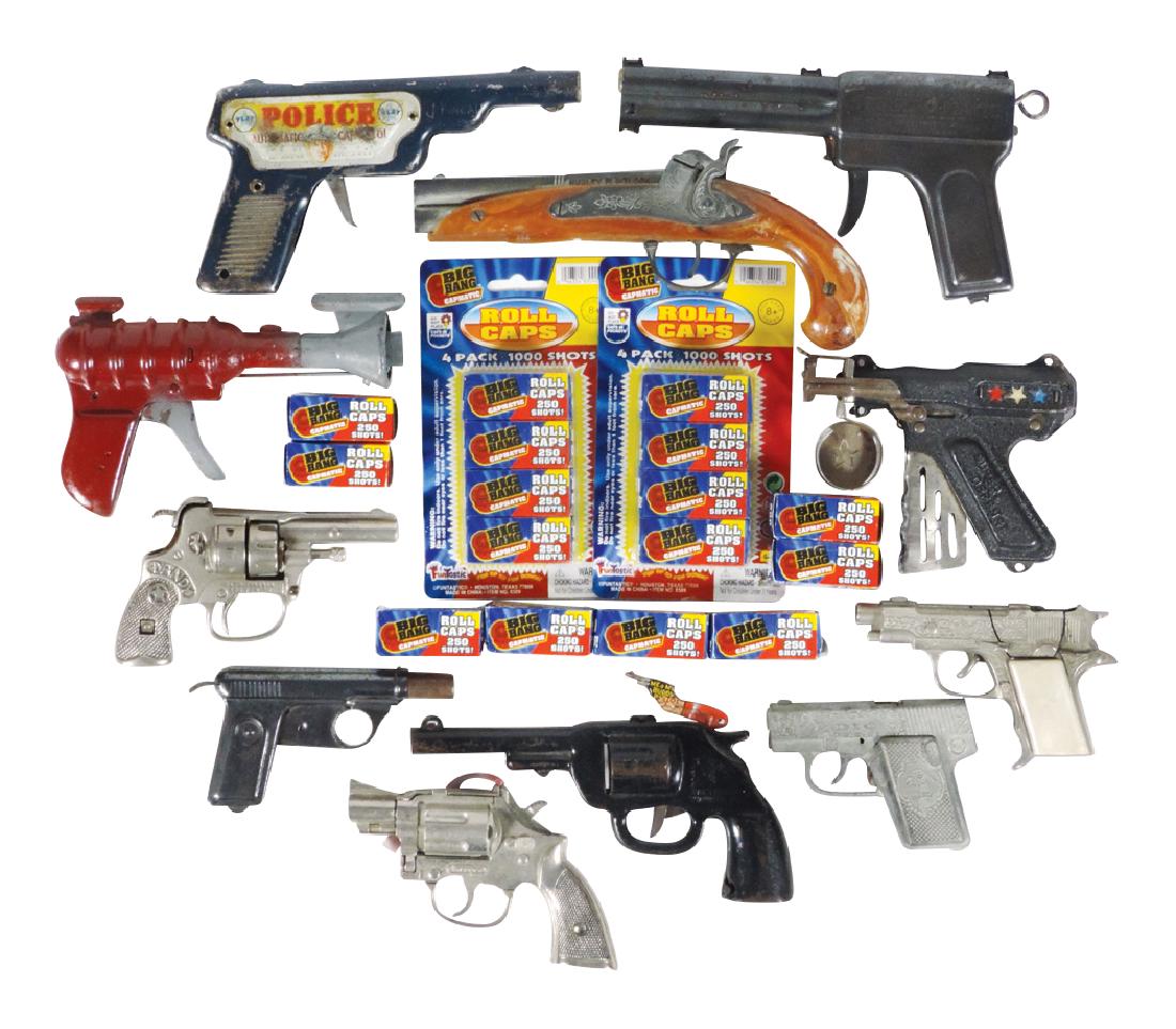 Toy cap guns (11) plus caps, Hubley Dandy cast iron,: Toy cap guns (11) plus caps, Hubley Dandy cast iron, Hubley Trooper, Flintlock, Dick & Hawk, All-Metal Products pop space gun, Daisy Squirt-O-Matic & Daisy No. 7 Water Pistol, Police Automatic Cap Pis