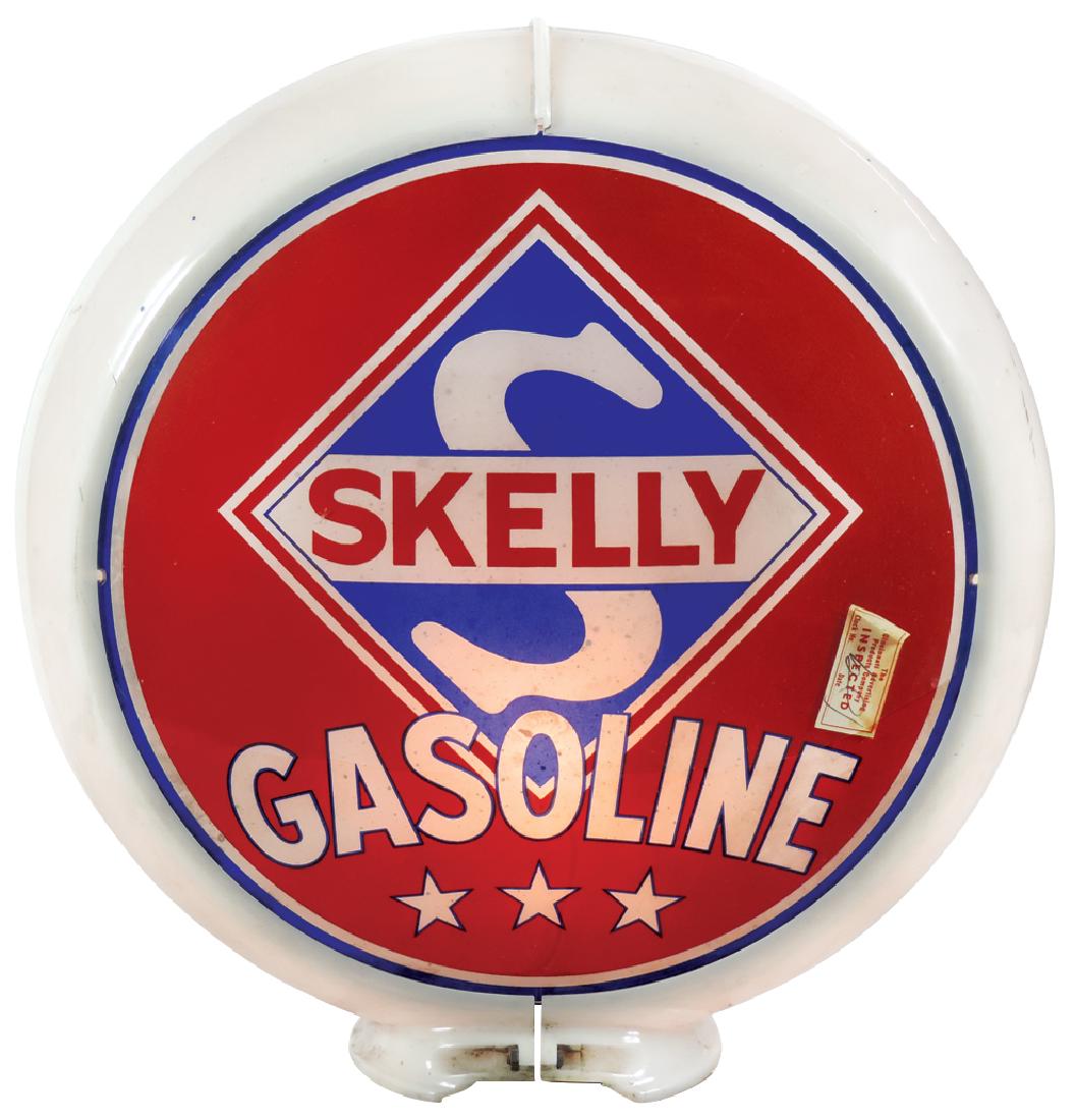 Gasoline globe, Skelly Gasoline & Skelly Supreme, 2: Gasoline globe, Skelly Gasoline & Skelly Supreme, 2 curved glass lenses in Capcolite body, one lens w/small bruise, o/wise VG cond, 16"Dia.