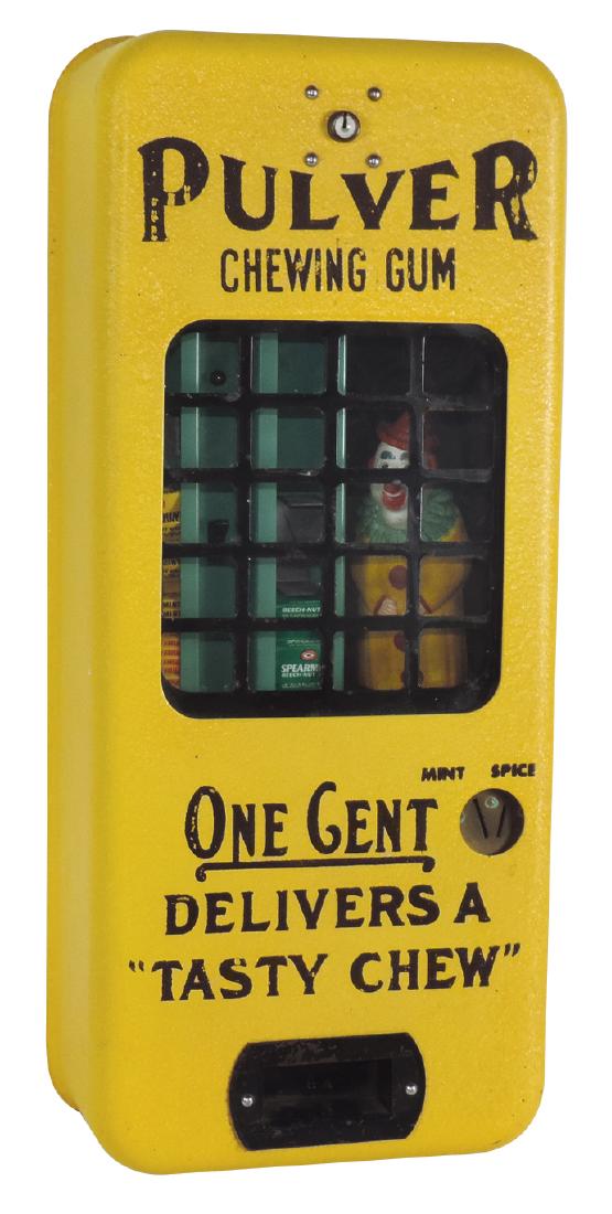 Coin-operated chewing gum vendor, Pulver w/clown: Coin-operated chewing gum vendor, Pulver w/clown figure, orig yellow wrinkle finish, Exc+ wkg cond w/keys, 20.5"H x 9"W.