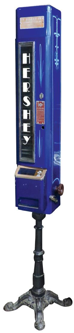 Coin-operated candy machine on cast iron stand, (1 of 1)