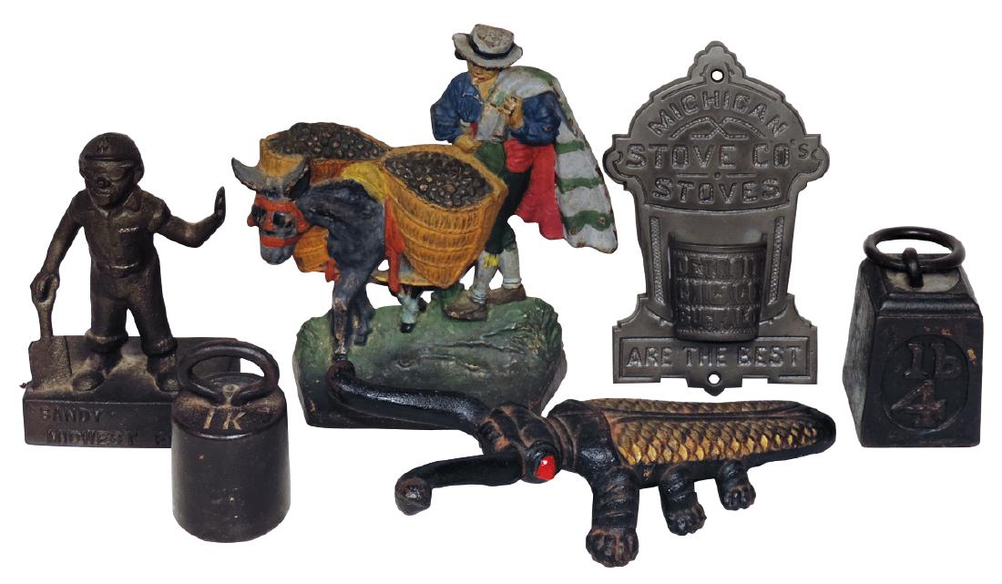Doorstop, boot jack, etc. (6), all cast iron, man (1 of 2)