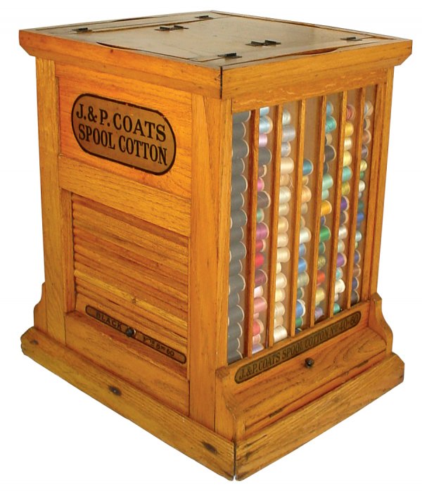 Spool cabinet, J.&P. Coats', oak case w/tambour ro: Spool cabinet, J.&P. Coats', oak case w/tambour roll-up ends, Exc orig cond w/lots of old thread, 33"H x 21"W x 16.5"D.