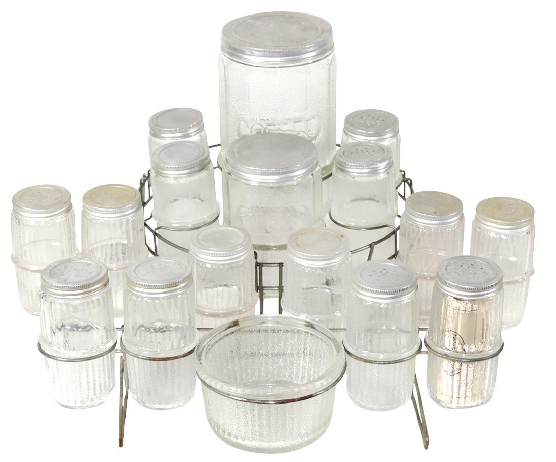 Kitchenware Hoosier Kitchen Cabinet Glassware w/holders: Kitchenware Hoosier Kitchen Cabinet Glassware w/holders (19), ribbed glass, 6 pc Hoosier set in round metal rack, jars embossed Coffee & Tea & 11 ribbed spice jars & salt bowl in wire rack, all Exc co
