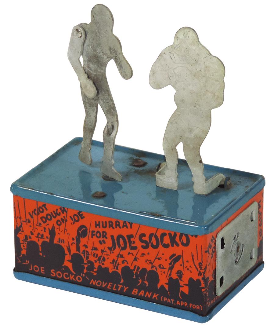 Mechanical bank, Joe Socko, fashioned after real life: Mechanical bank, Joe Socko, fashioned after real life boxer Joe Palooka, colorful litho on tin mfgd by Straits Corp.-Detroit, c.1937, Exc working cond, no key, 4.5"H x 3.5"W.