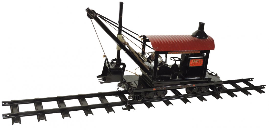 Toy Buddy "L" Outdoor Railroad Improved Steam Shovel,: Toy Buddy "L" Outdoor Railroad Improved Steam Shovel, pressed steel w/orig black paint, missing decals on bed, o/wise Exc orig cond, 22"L, comes w/section of 48" painted steel track.