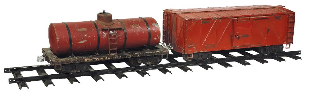 Toy Buddy "L" Outdoor Railroad cars (2), Tanker &: Toy Buddy "L" Outdoor Railroad cars (2), Tanker & Boxcar 96834, painted pressed steel, some paint & decal loss, o/wise VG cond, 18" & 21"L, comes w/section of 48" painted steel track.