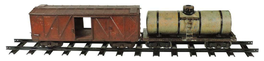 Toy train freight car, tank & track (3), The Milwaukee: Toy train freight car, tank & track (3), The Milwaukee freight car 1253, missing sliding door on both sides & tanker w/old weathered paint, Good & VG cond, 21" & 17.5"L, comes w/1 section of early 48"