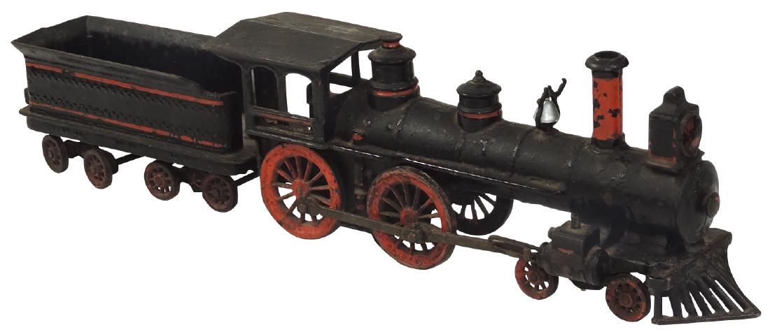 Toy train engine & coal car, cast iron w/orig paint,: Toy train engine & coal car, cast iron w/orig paint, unmarked, both VG cond, 21"L assembled.