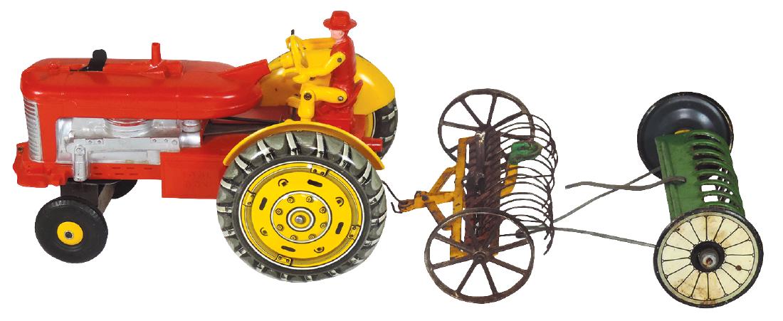 Farm toys (3), Marx Reversible Diesel Electric Tractor,: Farm toys (3), Marx Reversible Diesel Electric Tractor, battery-operated, plastic & metal w/litho on tin back wheels & rubber front tires, c.1950's, Exc untested cond, large Arcade cast iron hay rake,