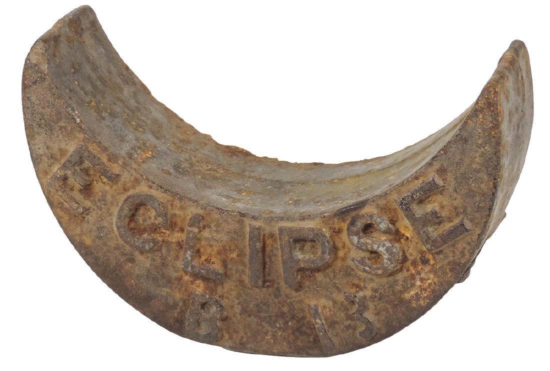 Windmill weight, Eclipse crescent moon shape, embossed: Windmill weight, Eclipse crescent moon shape, embossed cast iron, marked B13, VG cond w/orig weathered surface, 7"H x 10.5"W.