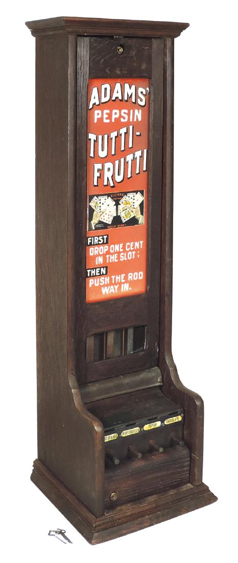 Coin-operated "L" gum vendor, Adams' Pepsin: Coin-operated "L" gum vendor, Adams' Pepsin Tutti-Frutti, 4-column offering Blood Orange, Wintergreen, Pepsin & Chocolate flavors, tall wood case w/adv window, c.1890's, Exc orig cond w/older surface 