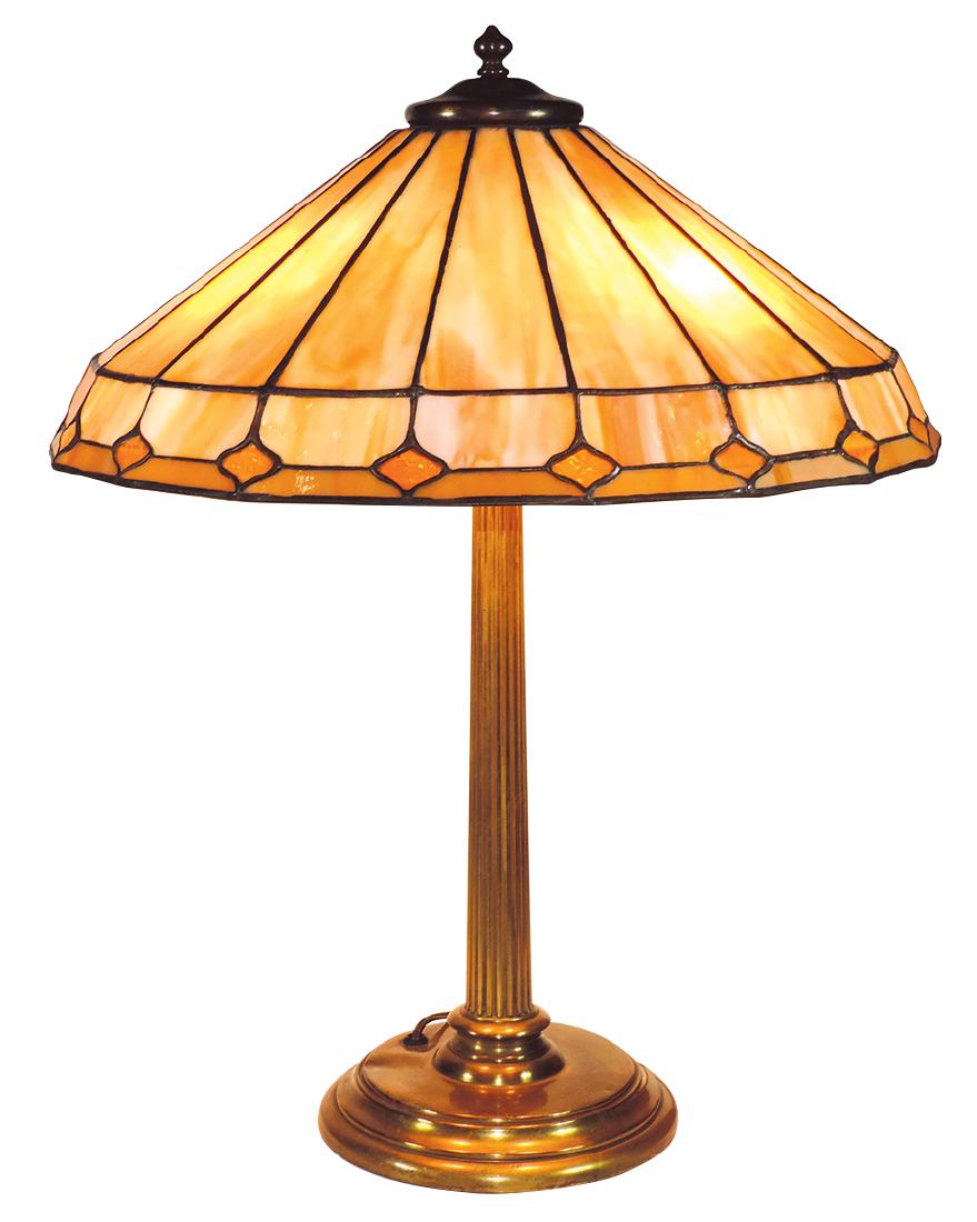 Lighting, Duffner and Kimberly stained glass table: Lighting, Duffner and Kimberly stained glass table lamp, 18 caramel slag glass panels w/angled skirt, heavy weighted solid brass base, 3 sockets w/pull-down chains, c.1920, Exc working cond, 24"H x 19